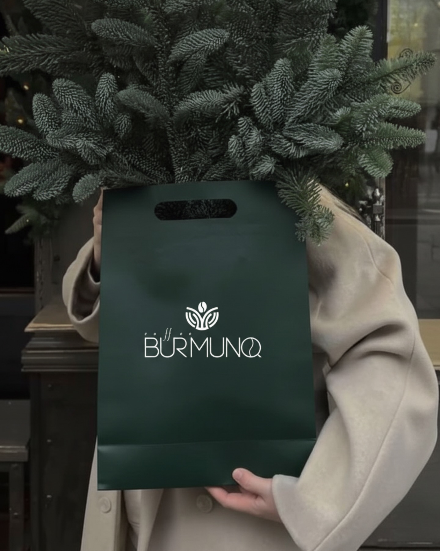 Coffee Burmunq gift bag with festive greenery